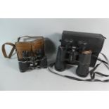 A Pair of Leather Cased Binoculars Together with a Cased Pair of Tecnar 10x50 Wide Angle Binoculars