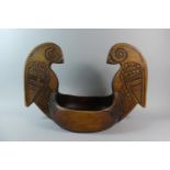 A Modern Carved Wooden Bowl the Extended Handles in the Form of Two Birds, 31cm high