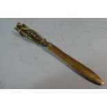 A Brass Letter Opener the Handle in the Form of a Joan of Ark, 24cm high