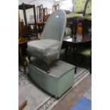 A Lloyd Loom Nursing Chair and a Bow Fronted Linen Box