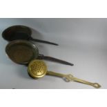 A Brass Chestnut Roaster and Two Brass Pans with Iron Handles