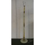 A Mid 20th Century Onyx and Brass Standard Lamp On Circular Base