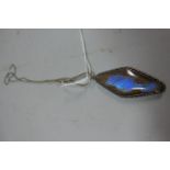 A Silver Necklace with Butterfly Wing Logenze Shaped Silver Cased Pendant