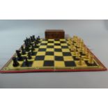 A Small Burr Wood Box Containing Weighted Wooden Chess Pieces, The King 6.5cm High