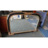 A Reproduction Gilt and Ebonised Framed Over Mantle Mirror, 103cm Wide