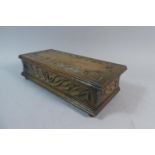 An Edwardian Oak Musical Cigar Box with Carved Hinged Lid, 24.5cm Wide