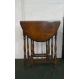 An Edwardian Oak Drop Leaf Gate Legged Oval Topped Occasional Table, 58cm Wide