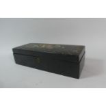 A Late 19th Century Lacquered Papier Mache Glove Box with Mother of Pearl and Painted Decoration,