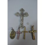 A Collection of Four Crucifixes and St. Christopher Pendant