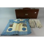 A Vintage Leather Case Containing Masonic Apron and Gloves, 44.5cm Wide