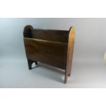 An Edwardian Oak Two Division Magazine Rack, 42cm Wide