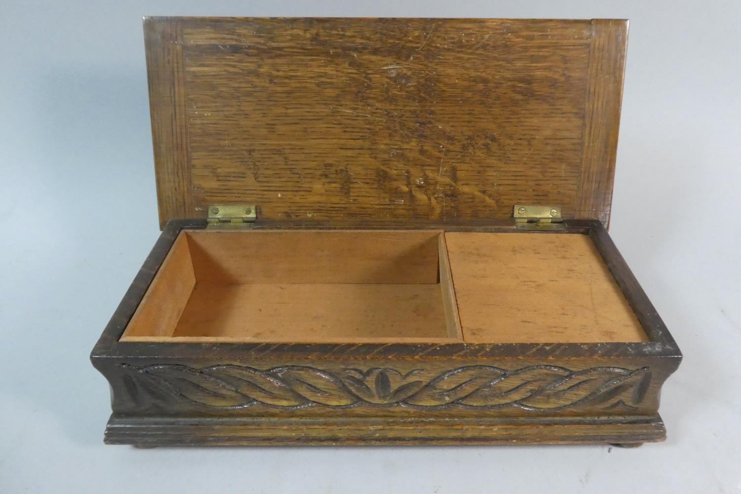 An Edwardian Oak Musical Cigar Box with Carved Hinged Lid, 24.5cm Wide - Image 3 of 3