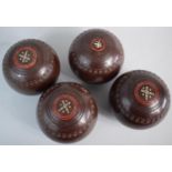 A Set of Four Matching Lawn Bowls. Size Five, Thomas Taylor, Lignoid