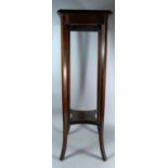 An Edwardian Mahogany Square Topped Jardiniere Stand with Stretcher Shelf, 30cm Square