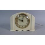 A White Bakelite Mantle Clock with Electric Movement, 19cm Wide