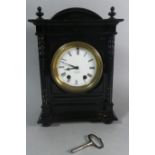 A Black Painted Seth Thomas Mantle Clock with Key, 30cm High