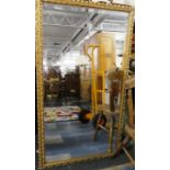 A Large Gilt Framed Bevel Edge Wall Mirror with Pierced Moulded Frame, 76cm x 135cm