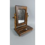 A Swing Mirror on Rectangular Base, 37cm High