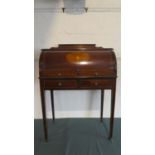 An Edwardian Mahogany Cylinder Bureau with Square Tapering Supports with Pull Out Leather Writing