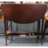 An Edwardian Mahogany Drop Leaf Sutherland Style Table with Stretcher Shelf by James Shoolbred and