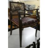 An Edwardian Cane Backed Mahogany Framed Armchair