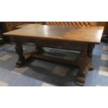 A Large Three Drawer Oak Library Table on Carved Bulbous Supports with Inset Tooled Leather