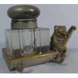 A Novelty Brass Desk Top Inkwell with Bear Holding Staff, 7cm high