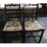 A Pair of Oak Ladder Back Dining Chairs