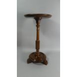 A Mahogany Circular Topped Stand on Turned Reeded Support, 30cm Diameter