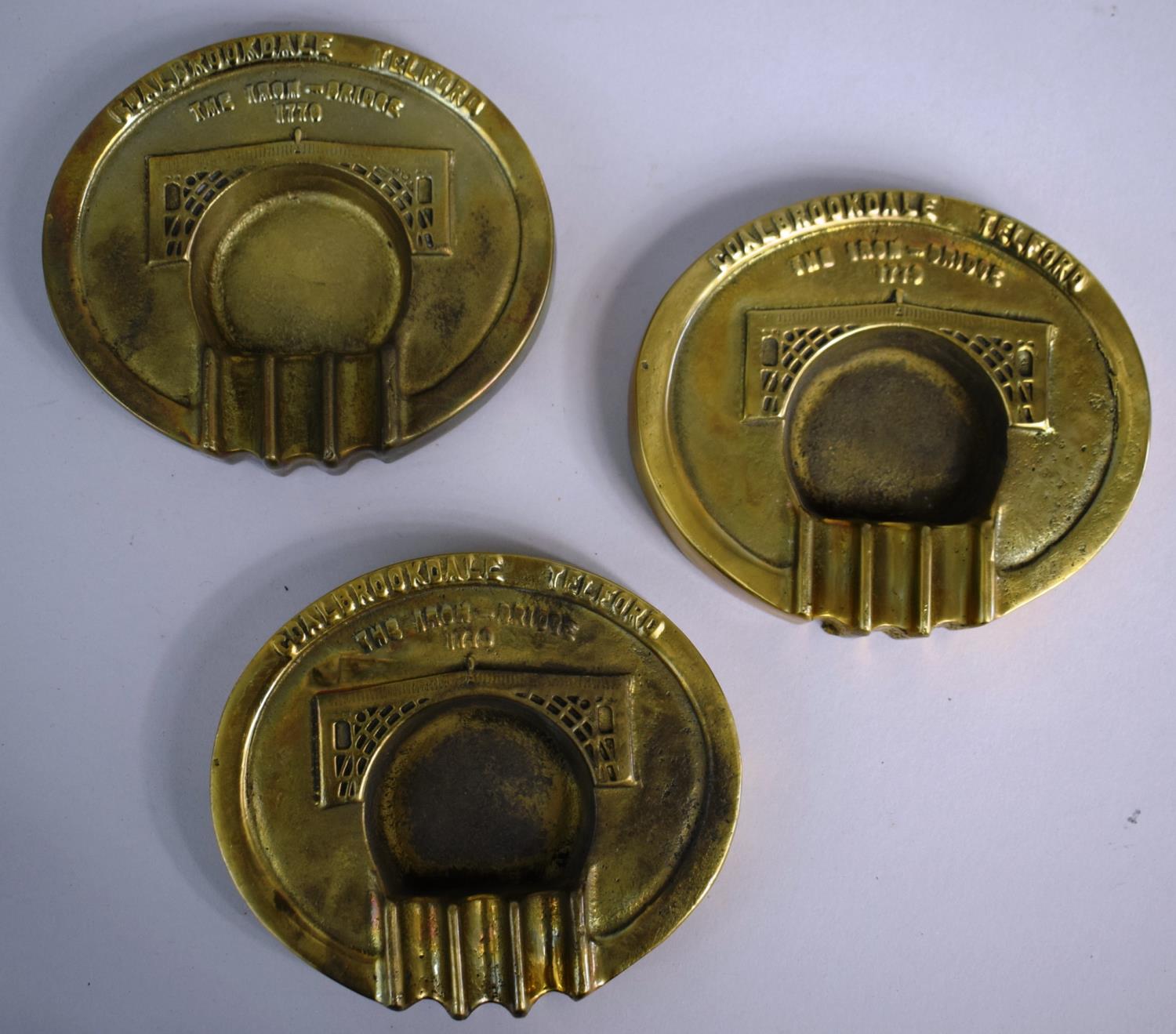 A Set of Three Cast Brass Coalbrookdale Oval Ash Trays Decorated with The Iron-Bridge 1779, Each - Image 2 of 3