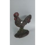 A Heavy Cast Metal Doorstop in the Form of a Cockerel, 29cm High