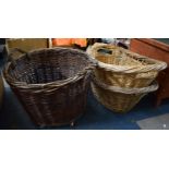A Collection of Three Vintage Wicker Log Baskets
