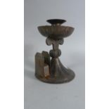 A Metal Arts and and Crafts Influenced Candle Stick with Matchbox Holder, 15cm High