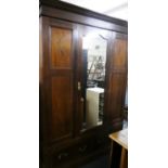 An Edwardian Inlaid Mahogany Triple Wardrobe with Mirrored Door and Two Base Drawers, 150cm Wide