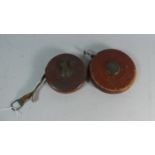 Two Leather Cased Vintage Tape Measures