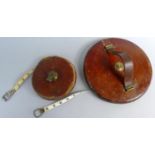 Two Vintage Leather Cased Tape Measures By Rabone, 100ft and 200ft