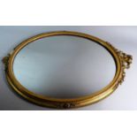 An Oval Gilt Framed Wall Mirror, Minor Losses to Frame, 73cm High