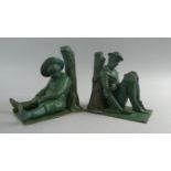 A Pair of Green Painted Novelty Bookends In the Form of Sleeping Don Quixote and Sancho Panza Both