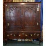 An Early 19th Century Country Oak Shelved Cabinet on Three Drawer Base with Short Cabriole Legs.