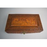 An Intricately Carved Wooden Box, Possibly Spanish South American Colonial, The Hinged Lid Depicting