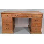 A Late Victorian Mahogany Kneehole Writing Desk with Three Top Drawers and Two Drawers Either Side