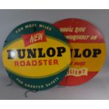 Two Vintage Circular Printed Cardboard Signs 'You'll Ride More Comfortably on Dunlop, They're More