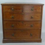A 19th Century Gothic Pitch Pine Chest of Drawers with a Plank Top Over Five Drawers Inlaid with