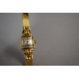 An 18ct Gold Ladies Dress Watch by Ebel. Overall Weight 32gms (Inc Movement)