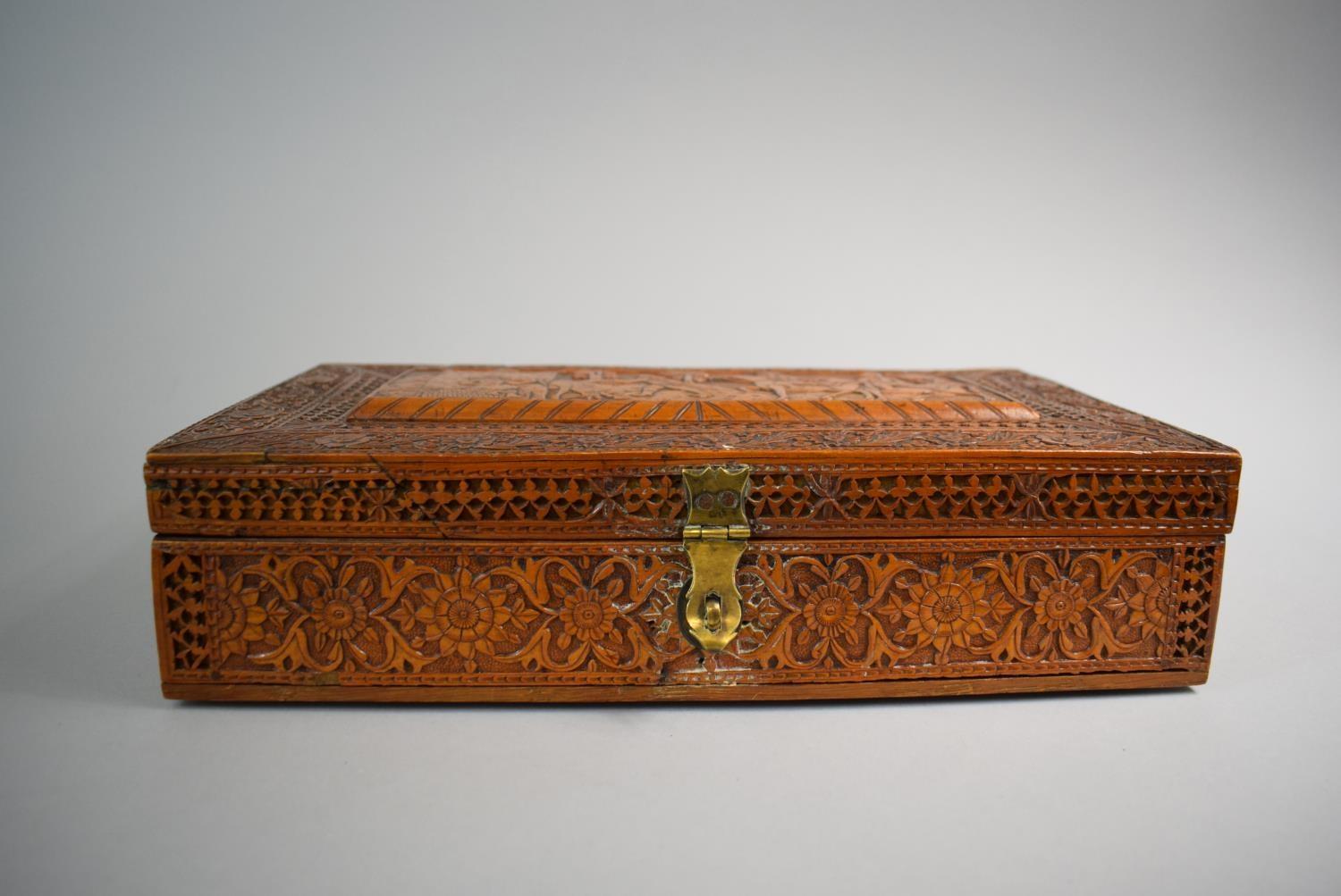 An Intricately Carved Wooden Box, Possibly Spanish South American Colonial, The Hinged Lid Depicting - Image 2 of 3