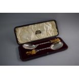 A Cased Pair of Oriental Ivory Mounted White Metal Serving Spoons with Faux Bamboo Handles and
