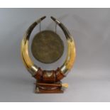 A Late 19th/Early 20th Century Horn and Oak Table Gong with hammer. 54cms High