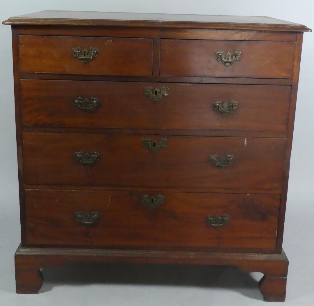 An 18th Century George III Mahogany Chest of Drawers with a Solid Top Over Five Drawers with Brass
