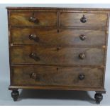 An Early 19th Century Mahogany Chest of Drawers with a Cross Banded Top Over Five Frame Mahogany