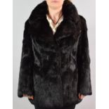 A Ladies Black Rabbit Fur Jacket